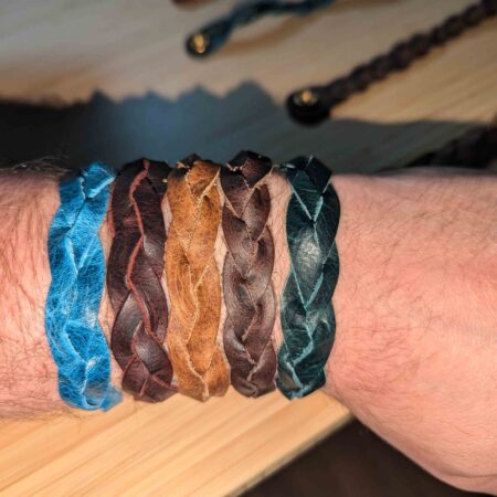 Mystery Braid Bracelets from left to right: Blue, Red, Light Brown, Dark Brown, Green